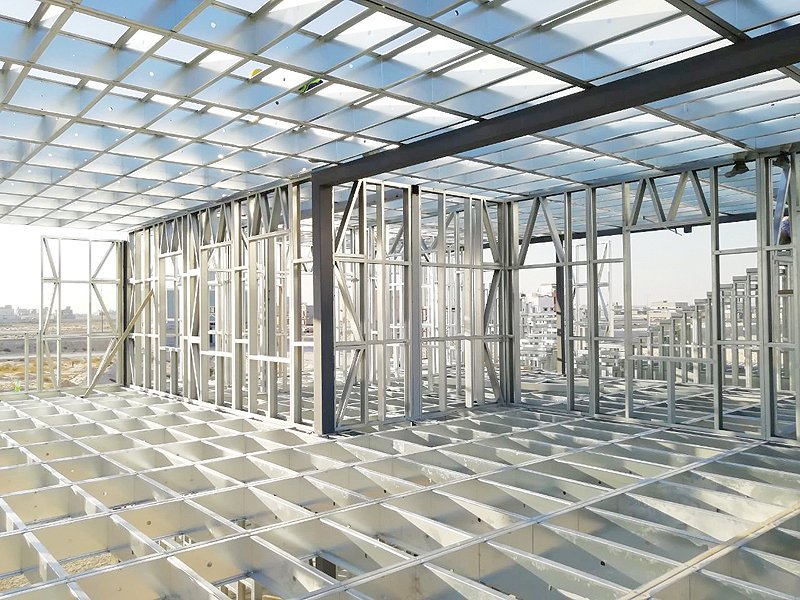 A modern construction site showcasing a steel framework structure, emphasizing the use of galvanised steel for urban infrastructure development.