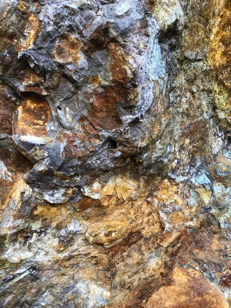 Close-up view of copper-rich ore at the Paikhel Copper Deposit, showcasing the visible mineral veins that highlight the high-quality copper content in this significant deposit.