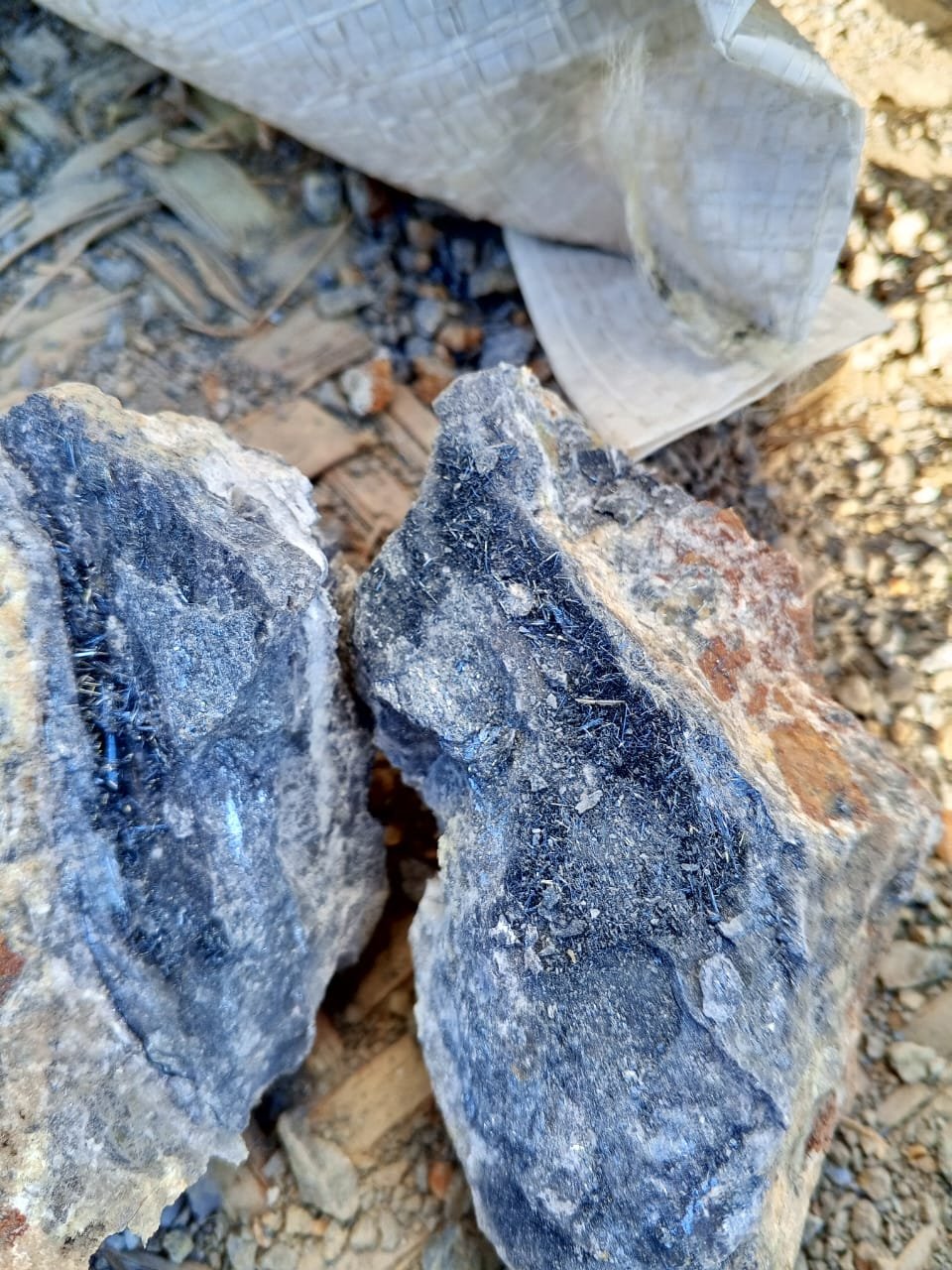 Raw antimony ore featuring metallic crystalline structures, sourced and processed by Bare Syndicate for industrial applications.